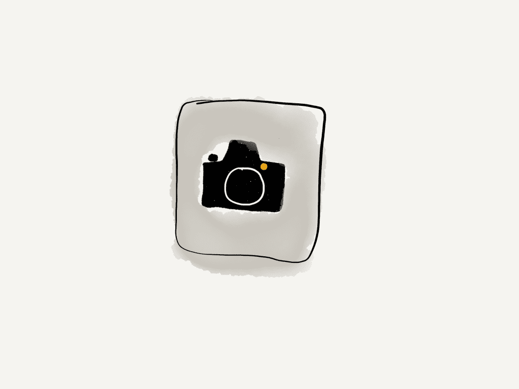 a hand drawn camera icon